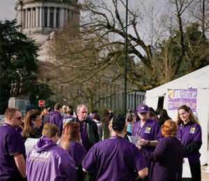 A frequent sight in Olympia: the purple shirts of the Service Employees Union Interntional (SEIU)