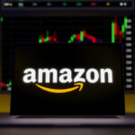 Amazon  logo on a laptop screen trading stock market